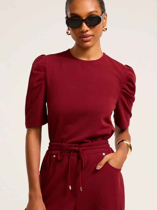 Blusa em crepe manga bufante fechamento nas costas bordô